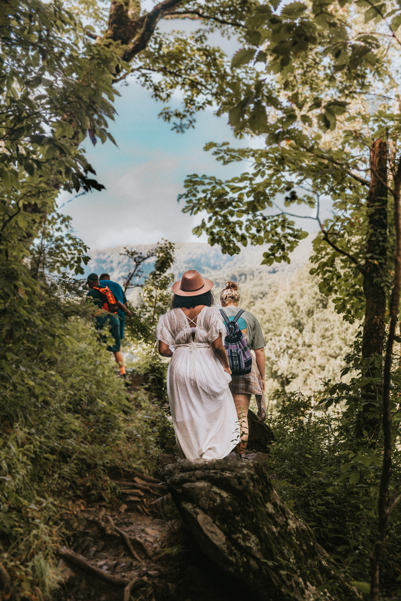 bride hiking up in the great smoky mountains for elopement photos