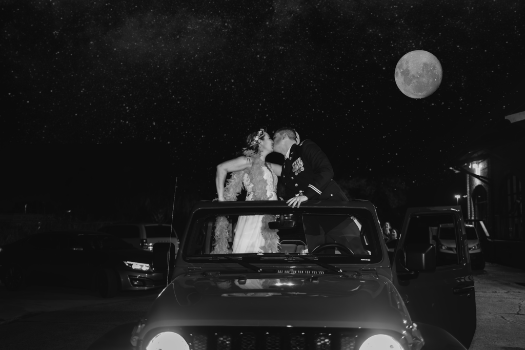 bride and groom jeep exit at night